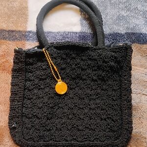 Elegant Black Kathy Ireland Handbag with Gold Accent